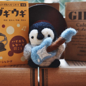 Little Penguin and its Soft Guitar Needle Felted Figure