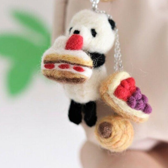 Panda which is crazily in love with cakes Needle Felted Keychain