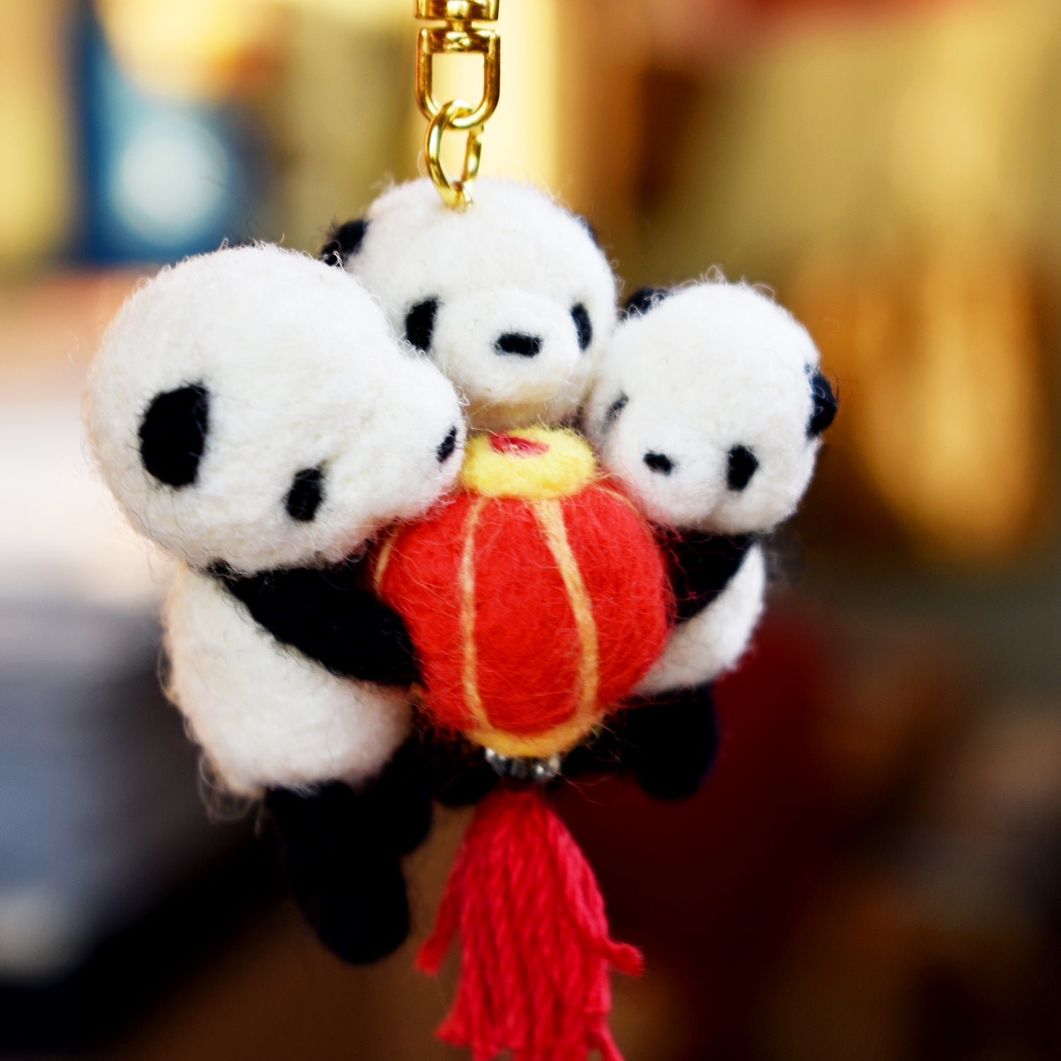 Panda Brothers fighting for a Chinese Lantern Needle Felted Keychain