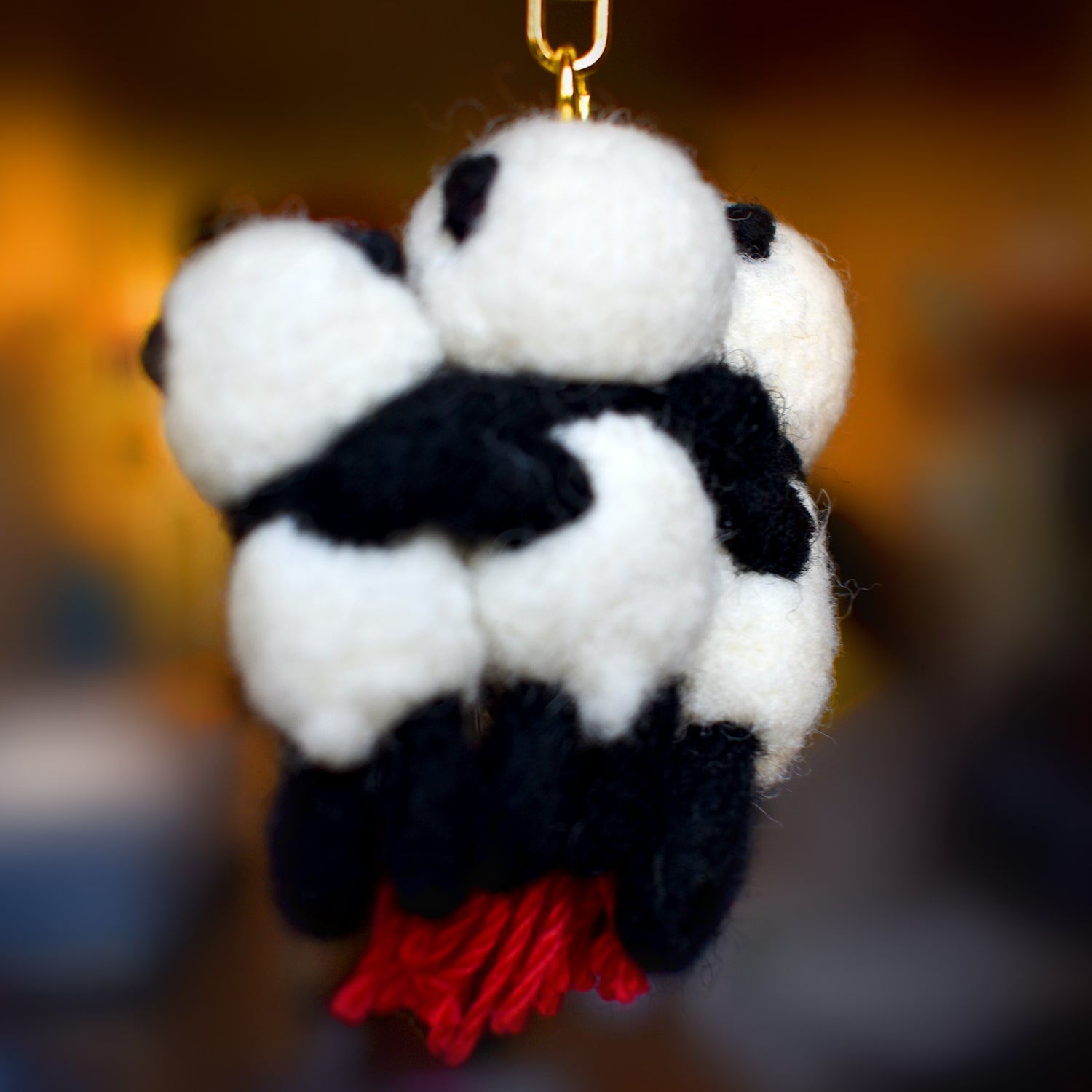 Panda Brothers fighting for a Chinese Lantern Needle Felted Keychain