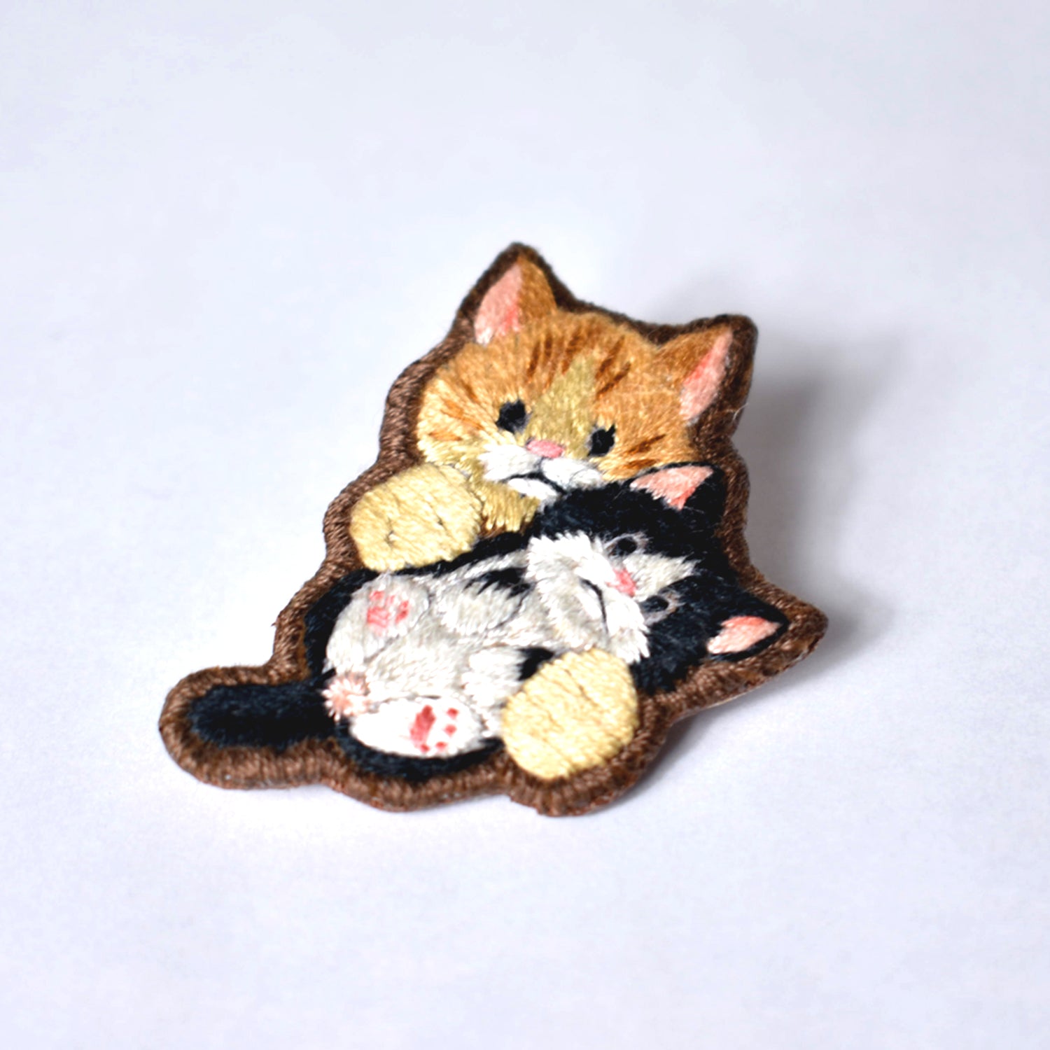 Red Tabby Cat Holding a Baby Tuxedo Cat Embroidered Brooch